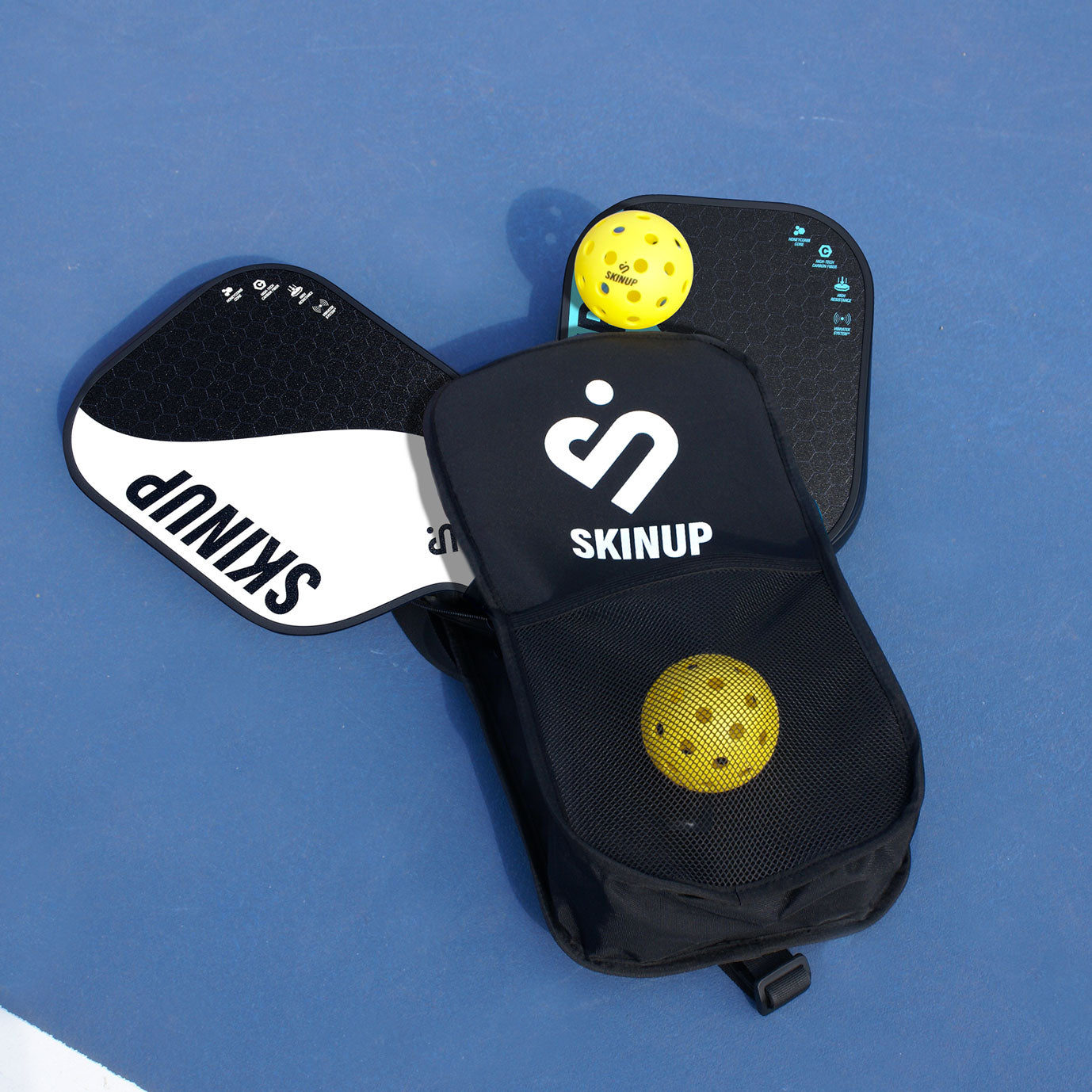 Kit pickleball 2 raquettes Yin Yang Bleu et Blanc, 2 balles et 1 housse SKINUP SPORT