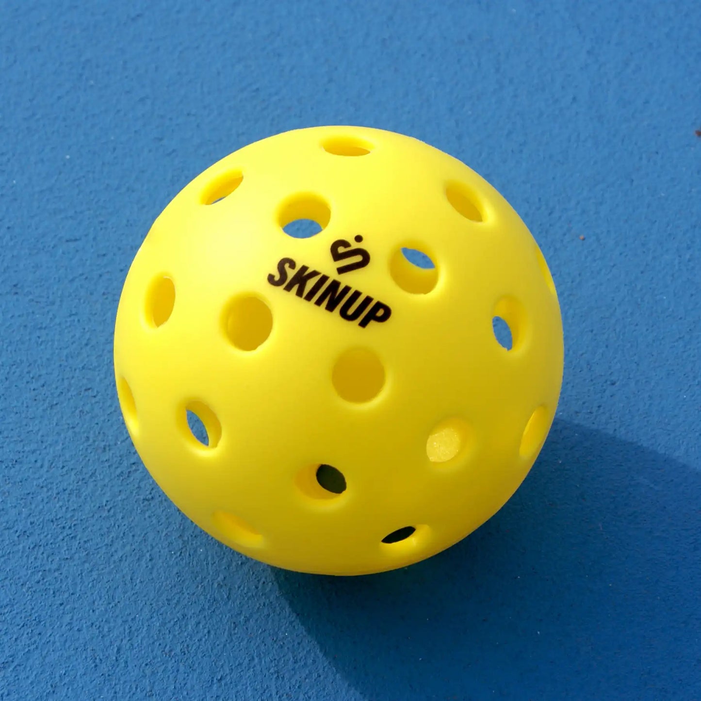 Balle hybride pickleball SKINUP SPORT - fond bleu