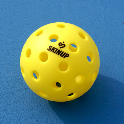 Balle hybride pickleball SKINUP SPORT - fond bleu