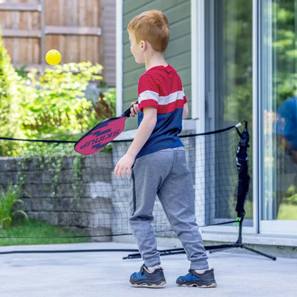 Raquette Kids+ Blanc Wave SKINUPSPORT en match - joueur en action