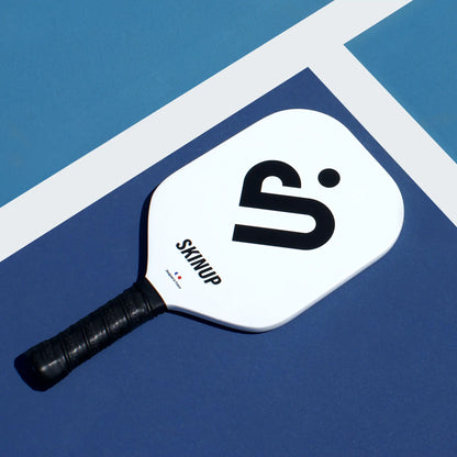 Raquette Full Molding blanche SKINUP SPORT - sur le terrain