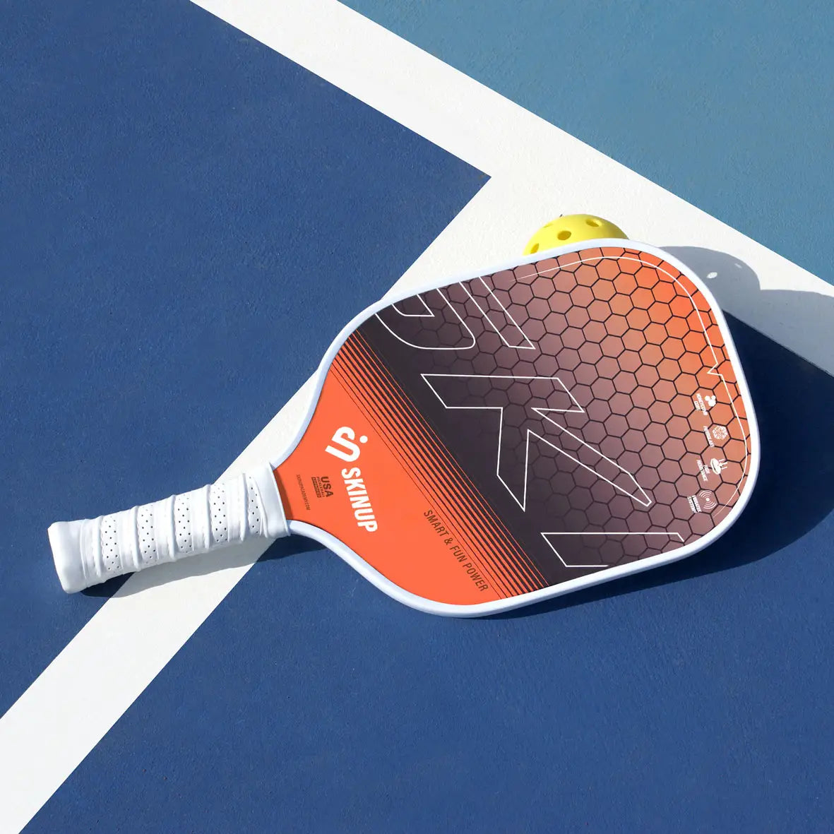 Raquette SKINUP SPORT Smart & Fun + orange – sur le terrain