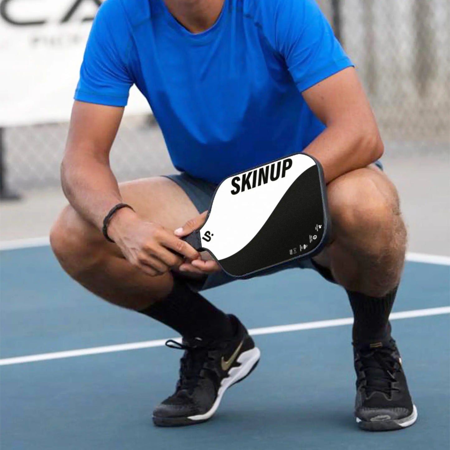 Raquette Yin Yang blanche SKINUP SPORT - avec le joueur